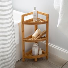 This Organize It All 3 Tier Bamboo Corner Shelf is perfect for any home space. The design makes it convenient to place in the corner of a room with easy access. This item is perfect for the bathroom as the bamboo frame is resistant to fading, breaking, and warping. Perfect for small bathroom or household items. The bamboo adds a clean and modern look to any room in the house. Organize It All Natural Brown 3-Tier Wood Freestanding Corner Bathroom Shelf (9.12-in X 24.62-in X 9.12-in) | NH-29973W1P Corner Of A Room, Bathroom Corner Storage, Corner Storage Shelves, Dorm Bathroom, Slatted Shelves, Bamboo Bathroom, Corner Storage, Wooden Bathroom, Cabinet Shelving