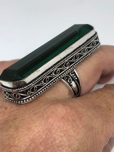 Large brilliant aqua antique glass Ornate German Silver Vintage ring, does not tarnish Size 6.75 My jeweler will re size for a $10-$20 fee All rings are shipped free in the US in a nice gift box. Check out our over a THOUSAND great reviews Engraving is $4 per letter and is not always perfect depending on the piece. It can take a few days if the jeweler is busy. This is payable to Paypal Judithsltd@gmail.com Unique Green Metal Ring, Green Crystal Ring Metal Gift, Bohemian Green Metal Rings, Handmade Green Metal Rings, Vintage Green Crystal Open Ring, Vintage Rectangular Emerald Ring Gift, Turquoise Art Deco Rings For Gift, Vintage Crystal Ring As Gift, Green Crystal Ring With Large Stone For Gift