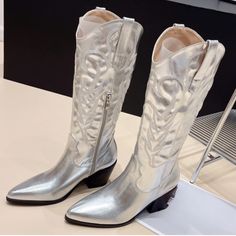 Crafted from soft PU leather, these casual cowgirl boots are perfect for everyday wear. With their comfortable fit and durable design, they provide both style and functionality. - Color: Silver, Blue, Black- Style: Boots- Closure Type: Zipper- Upper Material: PU Leather- Sole Material: Rubber- Heel Height: 6.5cm- Toe Style: Pointed Toe- Occasion: Casual- Gender: Women Casual Cowgirl Boots, Casual Cowgirl, Style Boots, Rubber Heels, Black Style, Cowgirl Boots, Silver Blue, Pre Order, Black Fashion