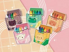 four different colored crayons in boxes on a pink and white background with an animal design