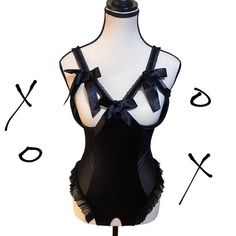 Y2k Venus Black Bow Bodysuit ⋆｡‧₊o♱༺𓆩❦︎𓆪༻♱༉.   Each order comes w/ a gift  † 🕊️   Lovely piece, perfect for fairycore, cybergoth & cybery2k outfits   Garment measurements:   34" chest  28" waist  25" length from top of strap   o Feel free to DM about any item Gothic Black Bodysuit For Halloween, Black Gothic Bodysuit For Halloween, Black Rave Bodysuit For Parties, Black Halloween Party Bodysuit, Halloween Party Black Bodysuit, Black Gothic Bodysuit For Costume Party, Black Gothic Bodysuit For Club, Gothic Bodysuit For Club, Cybery2k Outfits