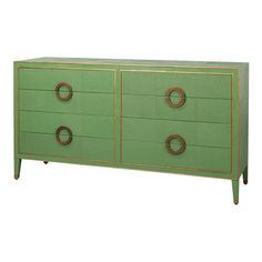 a green dresser with gold handles and two circles on the top, in front of a white background