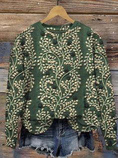 Fall Green Printed Blouse, Green Printed Blouse For Fall, Green Embroidered Long Sleeve Tops, Fall Season Green Printed Blouse, Green Embroidered Crew Neck Blouse, Green Printed Crew Neck Blouse, Patterned Long Sleeve Winter Top, Patterned Long Sleeve Tops For Winter, Fall Crew Neck Blouse With Graphic Print