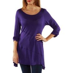 Perfect for any wardrobe, this tunic from 24/7 Comfort Apparel is sure to earn attention with its unique diagonal merrow stitch design. Crafted with a slightly stretchy knit blend, this loose fitting tunic has an airy construction for comfort with undeniable style. Flattering on any figure with its gathered 3/4 length sleeves, this top can be dressed up or down for a variety of looks. Color: Purple. Gender: female. Age Group: adult. Purple Tunic, Women Tunic Tops, Stitch Design, Womens Tunics, Spandex Fabric, Color Purple, Length Sleeve, Blouses For Women, Tunic Tops