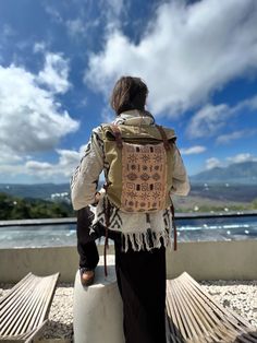 Comfy ethnic / boho / tribal style backpack made of natural canvas. Firm, durable, reliable. Decorated with embroidery by hand. It will serve you for many years. ▫️The hidden side has a pocket for your valuable items, keys and phone. Additionally there is a small pocket inside the main section. ▫️Closes with snap fasteners, two magnets on the sides. ▫️The length of the strap is adjustable. This duffel bag continues the series of shamanic clothing by «Ayaho». We aim to make unique items and care Bohemian Beige Backpack, Bohemian Brown Backpack, Bohemian Style Brown Backpack, Bohemian Brown Standard Backpack, Bohemian Backpack With Adjustable Strap For Travel, Bohemian Beige Rectangular Backpack, Bohemian Backpack For Everyday Use, Bohemian Backpack For Daily Use, Artisan Backpack For Travel