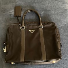 Black Prada Nylon And Leather Men’s Briefcase - Hardware Lock - A Little Wear On The Corners Of The Bottom But Good Condition. Inside Is Spot Less - Zippers Never Used Designer Nylon Bag For Formal Occasions, Designer Formal Nylon Bag, Luxury Briefcase With Leather Trim For Business Trips, Elegant Formal Nylon Bag, Designer Business Bag With Leather Trim, Designer Briefcase With Leather Trim For Daily Use, Formal Briefcase With Leather Trim, Luxury Nylon Business Bags, Luxury Business Nylon Bags