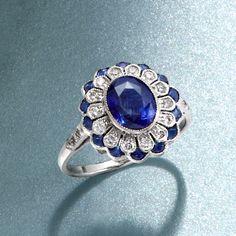 Ross-Simons - C. 1990 Vintage 2.10ct t. w. Sapphire, .50ct t. w. Diamond Floral Ring Oval Cut Size 7. C. 1990. The deep blue hues of this floral ring from our Estate collection will bring a calm sophistication to your ensemble. A central 1.70 carat oval sapphire is haloed by dazzling petals of .50 ct. t. w. round brilliant-cut diamonds. A second halo of .40 ct. t. w. kite-shaped sapphires adds another dimension of oceanic shimmer. Crafted in 18kt white gold with milgrain details. 1/2" wide. Diam Classic Blue Halo Ring, Classic Sapphire Ring With 17 Jewels In Platinum, Collectible Sapphire Ring With Center Stone, Collectible Sapphire Ring With Center Stone In Platinum, Collectible Round Sapphire Ring With Center Stone, Classic Sapphire Ring With 17 Jewels, Classic Platinum Sapphire Ring, Classic Sapphire Ring Collectible, Classic Sapphire Rings For Collectors