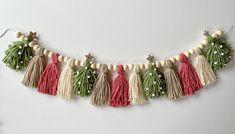 the tassels are decorated with beads and other things to make it look like christmas decorations