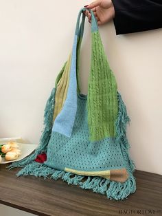 BagForLove - Chic Crochet Tote Bag with Stylish Color Blocking and Tassel Embellishment Product Description Color Green Bag Size Medium Pattern Type Plain Type Crochet Bags Material Fabric Composition 100% Polyester Size Chart INCH CM Bag Length Bag Width Bag Height Handle Height 14.2 inch 0.4 inch 16.9 inch 9.8 inch Bag Length Bag Width Bag Height Handle Height 36 cm 1 cm 43 cm 25 cm Details Pictures Similar Products h2 { text-align: center; } /* æ¢è¡ */ li{ white-space: normal; word-break: break-all; word-wrap: break-word; } .red-box { width: 100%; display: flex; flex-direction: row; flex-wrap: wrap; justify-content: center; } .red-box > div { width: 190px; height: 250px; margin: 10px; } .red-box > div > a > img { width: 190px; height: 250px; } .size-box { width: 100%; margin: auto; wh Green Bohemian Crochet Shopping Bag, Bohemian Green Crochet Shopping Bag, Green Bohemian Bags With Tassels, Bohemian Green Bag With Fringe, Bohemian Crochet Bag With Fringe For Shopping, Block Design, Crochet Tote Bag, Word Wrap, Crochet Tote