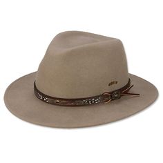 Our men's classic fedora hat is the ultimate travel companion. Fully crushable and water-repellent, it also features genuine pheasant feathers woven into the leather band. A special two-size-fits-all stretch band makes for a perfect fit. Men's fedora hats in brown. Wool felt. Spot clean with damp cloth. Made in USA. <br />Sizes: S/M(6¾-7⅛), L/XL(7¼-7⅝). 2½" brim with 4½" crown. Beige Wool Felt Hat For Fall, Elegant Felt Hat For Travel In Fall, Elegant Felt Hat For Fall Travel, Outdoor Fedora Hat In Felt, Wide Brim Wool Felt Hat For Fall, Classic Felt Hat For Fall Country Events, Winter Wool Beige Hat Band, Beige Wool Felt Hat For Winter, Beige Fur Felt Hat For Fall