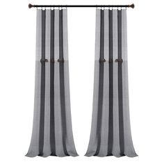 two gray and white curtains hanging from a metal rod with wood handles on each side