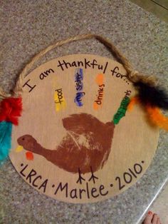 a handprinted ornament for a child's thanksgiving turkey