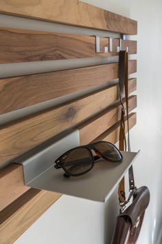 a pair of sunglasses sitting on top of a shelf