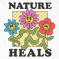 the words nature heals are painted on a white t - shirt with colorful flowers