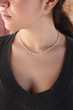 Pearl Beaded Necklace, June Birthstone, White Freshwater Pearl Choker Necklace, Layering Minimalist Jewelry, Dainty Gift for Mother's Day This simple, delicate and feminine necklace features white freshwater pearls wire wrapped in your choice of Gold Filled or Sterling Silver. This is a simple, classic and elegant necklace that is perfect on its own, or layered with other pieces. Necklace closes with lobster clasp and comes with a 2 inch extender regardless or the size you order, this will be he Delicate Beaded Necklaces With Round Beads, Delicate Single Strand Beaded Necklace For Gift, Delicate Single Strand Beaded Necklace As Gift, Adjustable Minimalist Pearl Necklace With Beaded Chain, Pearl White Dainty Beaded Chain Jewelry, Dainty Pearl Necklace With Gemstone Beads, Dainty Pearl White Beaded Chain Jewelry, Dainty Everyday Beaded Pearl Necklace, Delicate Adjustable Crystal Necklaces