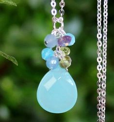 This classic necklace is the perfect blend of pretty and dainty. Perfect for layering. This stunning necklace combines a gorgeous Aqua Chalcedony stone, with small clusters of amethyst, Peridot and citrine gemstones. Great for the office or night out. Gemstones dangles on a sterling silver chain. Each gemstone may vary slightly in size and shape. Sterling silver chain measure 18 inches.  Cluster gemstone drop measure I.25  inches. Please select with or without chain. Also available in 24K gold p Chalcedony Stone, Classic Necklace, Aqua Chalcedony, Citrine Gemstone, Stunning Necklace, Gold Filled Chain, Sterling Silver Chain, Sterling Silber, Sterling Silver Chains