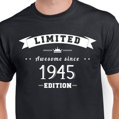 a man wearing a black t - shirt with the words limited, awesome since 1915