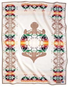 a white scarf with an orange, green and red design on the bottom is shown