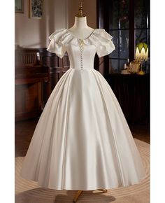 Get 10% off now! Buy retro satin ballgown wedding dress with lace neckline at wholesale price online. Free shipping and pro custom service since 2009. Luxury Satin Dress For Debutante Ball, Satin Dresses Mid Length, 8th Grade Prom Dresses, Brown Prom Dresses, Champagne Homecoming Dresses, Yellow Homecoming Dresses, Puff Sleeve Wedding Dress, Prom Dress With Lace, Era Victoria