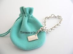 Offered for sale is a wonderful Tiffany and Co. Silver & "Sparkling" Diamond Envelope Charm bracelet.   The piece is made from substantial and bright Tiffany silver, and yet retains a very feminine feel to it.  Attached to its very substantial Tiffany Silver charm bracelet is a fantastic Envelope charm, accented with a gorgeous sparkling diamond.  The charm is attached to the bracelet with a Sterling Silver Tiffany Clasp - this clasp opens and closes and thus can be used as a charm on a ne Tiffany And Co Bracelet, Designer Bracelets, Sparkling Diamond, Silver Charm Bracelet, Tiffany Style, Tiffany And Co, Bracelet Charm, Pendant Bracelet, Sparkle Diamonds