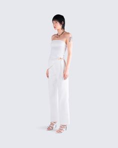 Nothing beats a monochromatic fit 🤍 Featuring an ivory symmetrical top, paired with low rise tie pants - this ensemble exudes effortless chicness in a way that will impress them all 🤩 Feminine White Summer Pants, Fitted Off-white Summer Pants, White Cotton Bottoms For Night Out, Chic White Bottoms For Evening, Elegant Off White Summer Pants, Modern Evening Bottoms For Summer, Modern Summer Evening Bottoms, White Summer Evening Bottoms, White Evening Bottoms For Summer