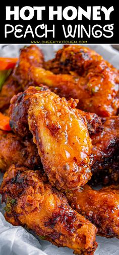 hot honey peach wings on a plate with carrots and celery in the background