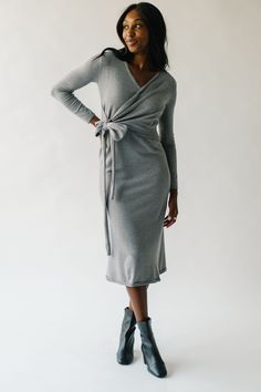 Get wrapped up in style with The Willner Wrap Sweater Dress! This heather grey dress features a flattering wrap design that will hug your curves in all the right places. Its soft and comfortable material makes it perfect for chilly days or cozy nights in. This versatile dress is a must-have for any wardrobe! Details self/lining: 50% viscose + 28% polyester + 22% polyamide Fabric Care Guide Here Sizing & Fit Measurements are approximate and taken while laying flat across the front. Not doubled. s Gray Dress For Fall Loungewear, Gray Dress For Loungewear In Fall, Gray Fall Loungewear Dress, Gray Loungewear Dress For Fall, Gray V-neck Midi Dress For Fall, Fitted Wrap Dress For Fall, Chic Wrap Dresses For Loungewear, V-neck Midi Dress For Winter Loungewear, Piper And Scoot