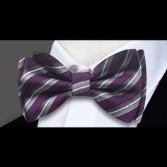 Stripes of Elegance: The Multicolored Stripe Bow Tie Collection Dive into a world of sophistication and style with the Multicolored Stripe Bow Tie Collection – a captivating assortment of bow ties available in a mesmerizing palette of purple, blue, and red. This collection celebrates the timeless charm of stripes, inviting you to embrace a symphony of colors that redefine the art of dapper dressing. Available as self-tie bow ties, each piece tells a unique story of elegance and versatility. A Sy Elegant Purple Bow Tie For Party, Elegant Multicolor Bow Tie, Purple Bow Tie For Party, Purple Party Bow Tie, Charcoal Gray Suit, Light Blue Dress Shirt, Tie Collection, Silk Bow Ties, Tie Bow