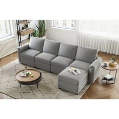 a living room scene with focus on the sectional sofa