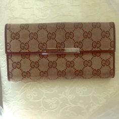 100% Authentic Monogram Vintage Gucci Wallet Long. Genuine Leather. Priced To Sell Quickly!! Item In Good Condition, Gently Used, Could Use A Thorough Cleaning , 7 Slot Credit Card Hold, Bill Fold And Shine Gucci Trademarked Snap Close Change Pouch. Sm Stain Shown In Photo Only Visible When Change Pouch Closure Snap Is Exposed. Please Also Note Some Minor Ware On One Of The Cc Slots (Both Shown In Photos Above. Originally Paid $498.00 Asking $265.00 Obo! Approx. Measurements 7.5”W By 4”H. Gucci Wallet, Tan Brown, Vintage Gucci, Continental Wallet, To Sell, Slots, Credit Card, Genuine Leather, Stain