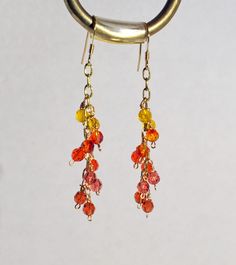 Orange Crystal 14K yellow gold Earrings. Ear wires are 14K yellow gold filled Tarnish resistant gold wire wrappings. Approx. 2" long I combine shipping - just put items in your cart and buy but do not pay until you receive a statement from me. Wedding Orange, Orange Jewelry, Dance Stuff, Portland Me, Orange Crystals, Orange Earrings, Yellow Gold Earrings, Earrings Ear, Yellow Gold Earring