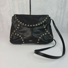 Lauren Ralph Lauren Black Leather Morley Crossbody Bag With Metal Grommet Detail. Stunning Lauren Ralph Lauren Morley black lamb leather crossbody bag! Great pre-owned condition with light use/wear including some light marks on the strap (see photo) and the bag is missing the decorative metal LRL bag charm that is attached by a leather strap. Otherwise, the bag is in excellent shape inside and out! Buttery soft, black leather with gold-colored metal grommet details on front and back, soft fabric Ralph Lauren Purses, White Crossbody Bag, Brown Leather Crossbody Bag, Ralph Lauren Bags, Ralph Lauren Leather, Small Crossbody Purse, Black Leather Crossbody Bag, Decorative Metal, Leather Crossbody Purse