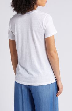 A single patch pocket punctuates the chest of this everyday T-shirt made from a soft and breathable cotton blend. 25 1/2" length (size Medium) Crewneck Short sleeves Chest patch pocket 60% cotton, 40% modal Machine wash, dry flat Imported White Graphic Tee With Pockets, Relaxed Fit Linen Top With Graphic Print, Everyday White Linen T-shirt, White Cotton T-shirt With Side Pockets, White Linen T-shirt For Everyday, White Crew Neck Top With Side Pockets, White Cotton Tops With Side Pockets, White T-shirt With Side Pockets For Everyday, Everyday White T-shirt With Side Pockets