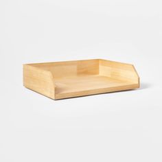 an empty wooden tray on a white background