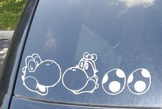 an image of some mario bros stickers on the side of a car