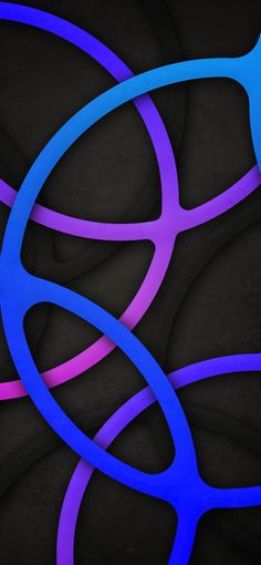 an abstract background with blue and purple circles on black paper in the shape of rings