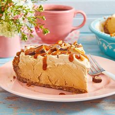 a piece of pie sitting on top of a pink plate