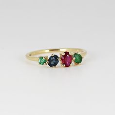 This beautiful cluster ring was made of 14k gold band, 14k gold prong settings. It's perfect as engagement ring or statement piece. DETAILS ABOUT THE RING, MATERIAL AND STONES * 14k 1.2 mm solid gold band and prongs. * 5x3.5 mm oval shape ruby * 4x3 mm oval sapphire * 4x3mm 0val emerald * 2.5mm round emerald * Birthstones : September, May, July We can make this design with any of gemstones. Please contact us. This ring was hand crafted in Melt'm Jewelry Studio in California. Thanks for visiting Stone Ring Design, Sapphire Cluster Ring, Emerald Birthstone, Multi Gemstone Ring, Ring Sapphire, Solid Gold Band, Jewelry Studio, Gold Band, Cluster Ring