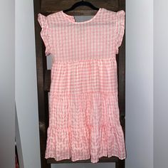 Pink Checkered Babydoll Dress Size Us 2 (Au/Uk 6) Sleeveless With Adorable Shoulder Ruffle! Flowy And So Comfortable! 35% Cotton, 65% Polyester Cute Gingham Dress With Short Sleeves, Cute Short Sleeve Gingham Dress, Cute Beach Dress With Ruffle Hem, Summer Gingham Dresses With Ruffles, Summer Gingham Dress With Ruffles, Summer Gingham Dress With Ruffle Hem, Gingham Dress With Ruffle Hem For Vacation, Gingham Tiered Ruffle Dress, Gingham Beach Dress With Ruffle Hem