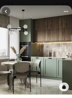 an image of a kitchen with green cabinets