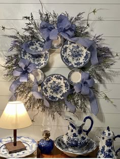 a blue and white wreath on the wall