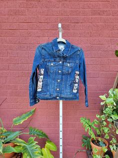 Women's Denim Jacket size .  Please see photo's for measurements. Restyled with patches of rescued textiles. 🧺 CARE INSTRUCTIONS 🧺 To keep the jacket in beautiful condition, please Machine wash in COLD, tumble dry or lie flat to dry. 📬 Ships from my home studio in Center Valley, PA, via USPS with tracking. ✨ I am not responsible for packages once they have been scanned in at the Post Office. I have no control over USPS shipping delays, losses, or damages. I do not refund or replace for USPS i Dark Wash Denim Jacket With Patches For Fall, Fitted Long Sleeve Denim Jacket In Recycled Denim, Fitted Dark Wash Recycled Denim Outerwear, Fitted Recycled Denim Outerwear For Fall, Recycled Denim Outerwear With Patches For Fall, Fall Recycled Denim Outerwear With Patches, Recycled Denim Long Sleeve Outerwear For Fall, Long Sleeve Recycled Denim Outerwear For Fall, Fall Outerwear In Recycled Denim With Patches