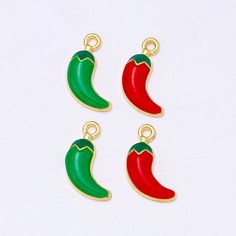 **Get this Charm for FREE with the purchase of any charm bracelet  Good for charm bracelets, handbag charms, zipper pulls, and pendants, key rings, keychains and earrings. Enameled Red or Green Chili Pepper Charm.  Goldplated, hollow back. Messures 3/4 x 1/4.  Zinc alloy, lead-free. Comes with jump ring not pictured.    All items in stock and ships from Tennessee. Free Shipping Red Enamel Jewelry With Charms, Green Charms With Lobster Clasp For Gift, Red Dangle Charms With Lobster Clasp, Enamel Dangling Charms For Gifts, Novelty Red Charms Jewelry, Red Novelty Jewelry With Charms, Novelty Red Jewelry With Charms, Green Chili Peppers, Green Charms