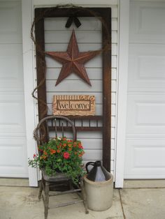 a screen shot of the front door of a house with an iron star on it