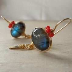 Labradorite Earrings, Labradorite Coral Crown Earrings, Gemstone Earrings, Gold Filled Jewelry, Anniversary Gift, Bohemian Jewelry These labradorite earrings are delicate, minimalist and bold. Unique settings of genuine labradorite gemstone and beautiful coral crown on top. A shiny handmade gold filled leaf dangles gently. Each leaf is hand crafted by me, and has its own unique shape. These earrings would be a beautiful gift for your special one or yourself. The hook is made of gold filled. The Elegant Handmade Labradorite Earrings, Handmade Artisan Labradorite Earrings, Coral Crown, Crown Earrings, Gemstone Properties, Gemstone Earrings Gold, Labradorite Earrings, Handmade Gold, Gold Filled Jewelry