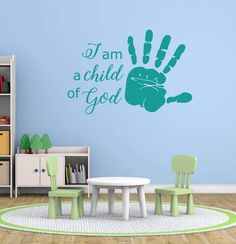 a child's room with a wall decal that says i am a child of god