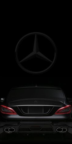 the back end of a mercedes car with its hood up