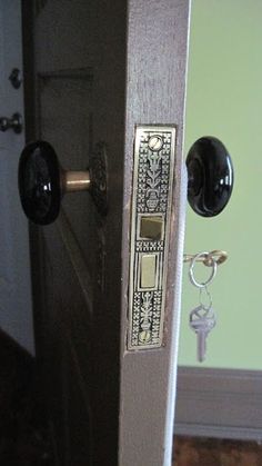 an open door with a key in it