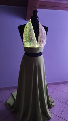 Step into the future of fashion with our stunning Long Maxi Dress featuring a mesmerizing LED Light-Up Fiber Optic Top. Handcrafted with meticulous attention to detail, this dress combines elegance with innovation to create a truly unique ensemble. Crafted from luxurious materials including cady and hand-embroidered tulle, this dress exudes sophistication and charm. The LED Light-Up Top adds a futuristic touch, transforming you into the center of attention at any event, whether it's a rave, fest Fiber Optic Fashion, Fibre Optic Dress, Led Fashion Wearable Technology, Futuristic Dress, Futuristic Costume, Outfit Party, Rave Outfit, Embroidered Tulle, Festival Clothing