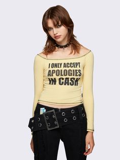 Add a splash of Y2K nostalgia and slogan mania to your wardrobe with our playful Yellow Off the Shoulder Top. Find more edgy grunge slogan graphic tops and cold shoulder tops at Minga London. Shop now! Y2k Nostalgia, Minga London, Edgy Grunge, Cold Shoulder Tops, Punk Princess, 40 Dress, Cargo Jacket, Shoulder Tops, Graphic Top